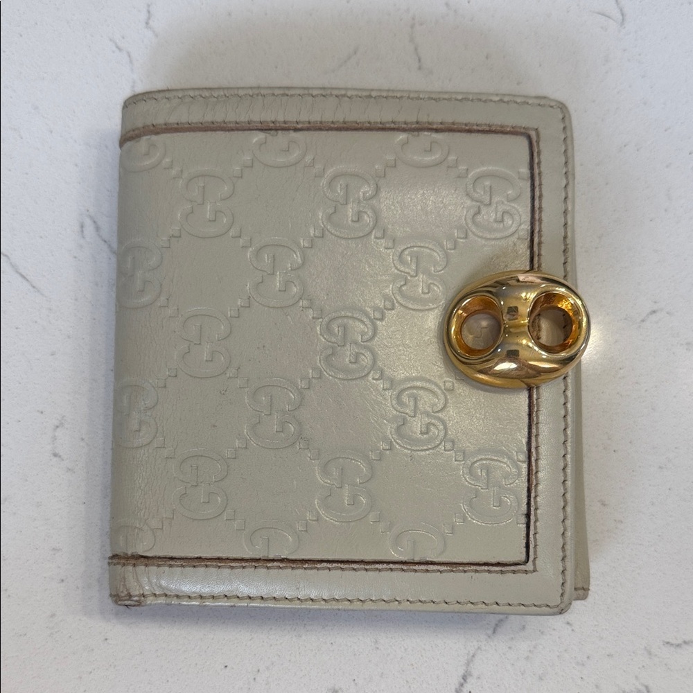 Authentic Gucci Designer Embossed Leather Wallet with Gold Accent